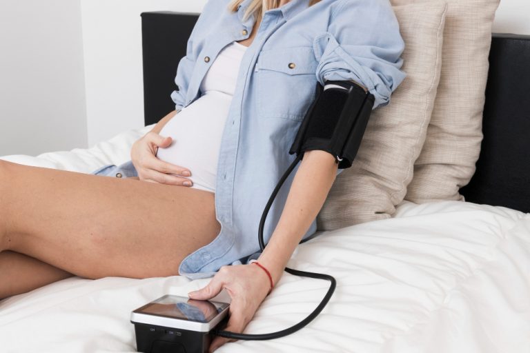 pregnant-woman-measuring-blood-pressure